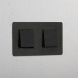 Interruptor de balancín de posición doble en bronce y negro - Detalle contemporáneo para el hogar